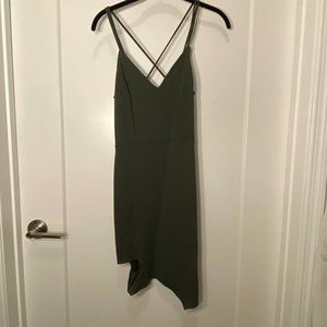 Green dress with cutout at bottom and strappy crisscross back